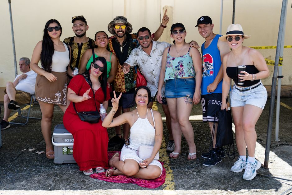 A group of friends enjoying a sunny day at Limón, Costa Rica's outdoor festival.